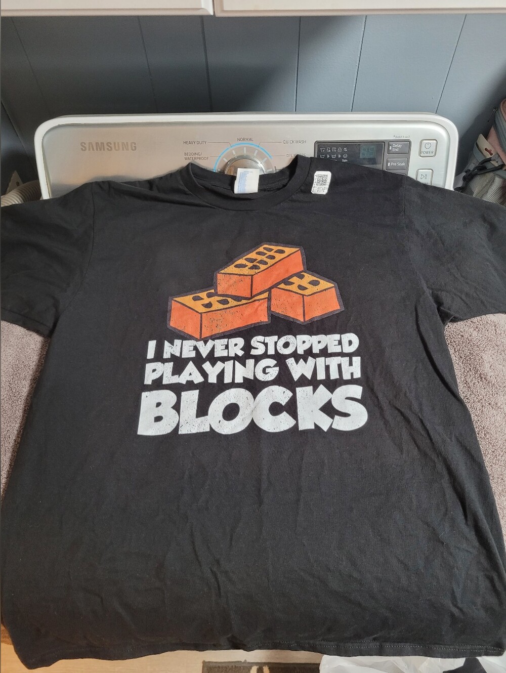 Mens Graphic Tee "I Never Stopped Playing With Blocks" - Black w/ Orange Print